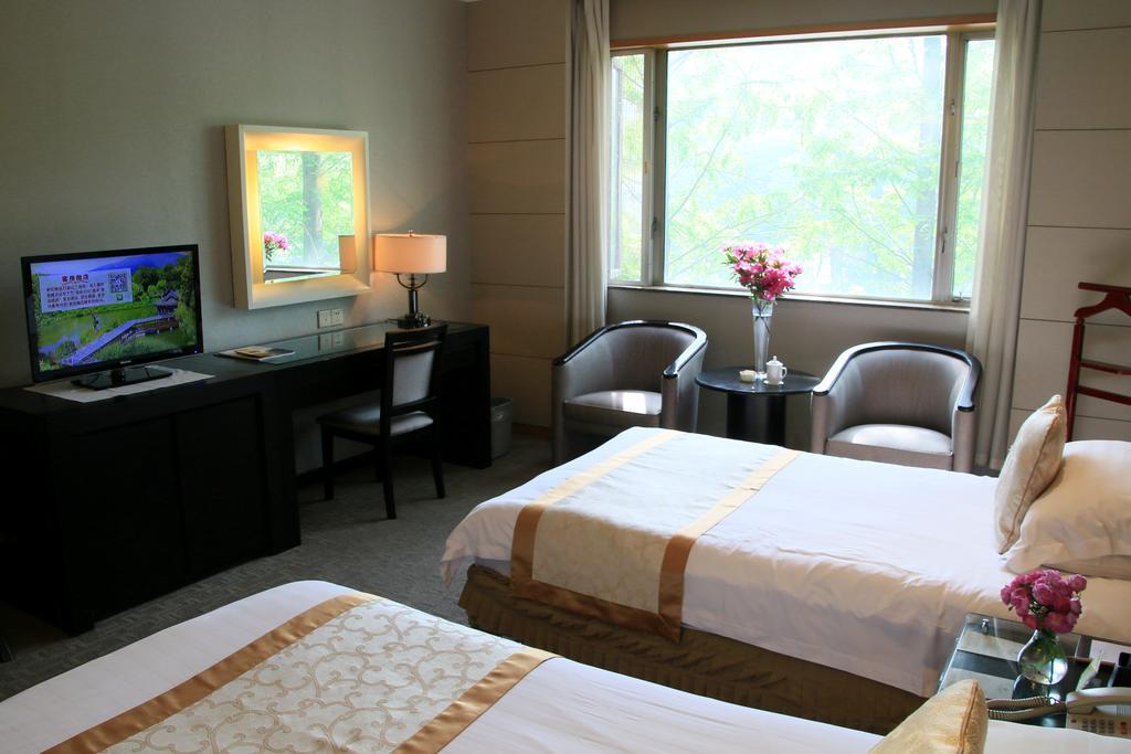 อินเตอร์เนชั่นแนล คอนเฟอเรนซ์ โฮเต็ล หนานจิง Hotel นานกิง ห้อง รูปภาพ